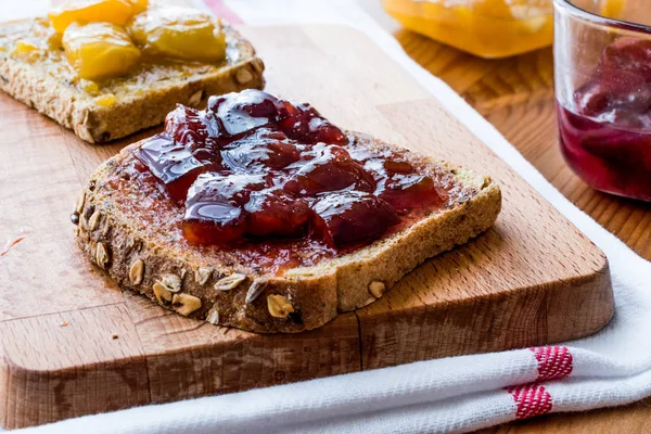 Damson Plum Jam on bread with Apricot jam