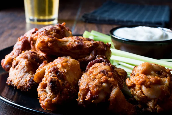 Buffalo Wings with Dip Sauce and Beer