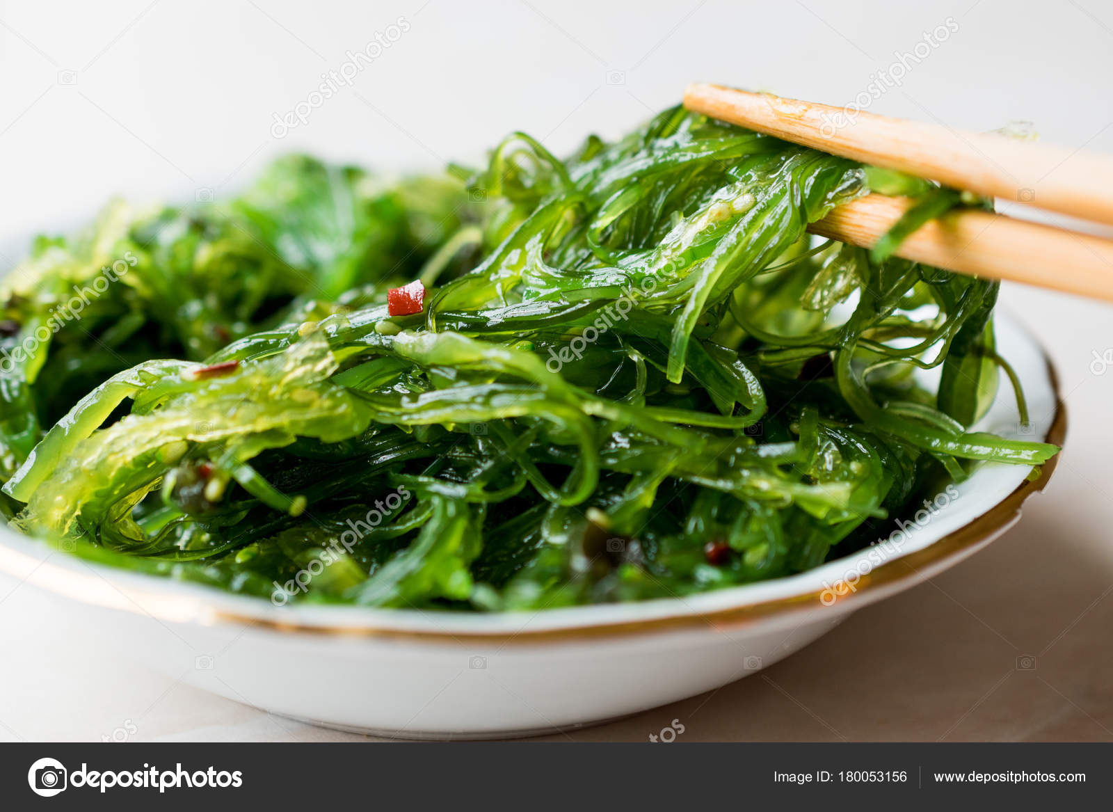 Japanese Wakame Seaweed Salad With Chopsticks Stock Photo