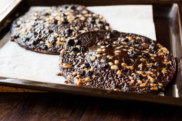 Chocolate Pizza with White Chocolate Balls in Baking Tray