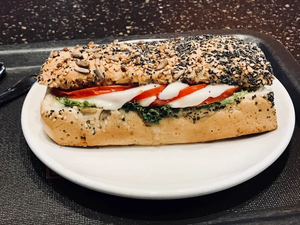 Mozzarella Sandwich in Poppy Seed Bread served with Tray. — Stock Photo, Image