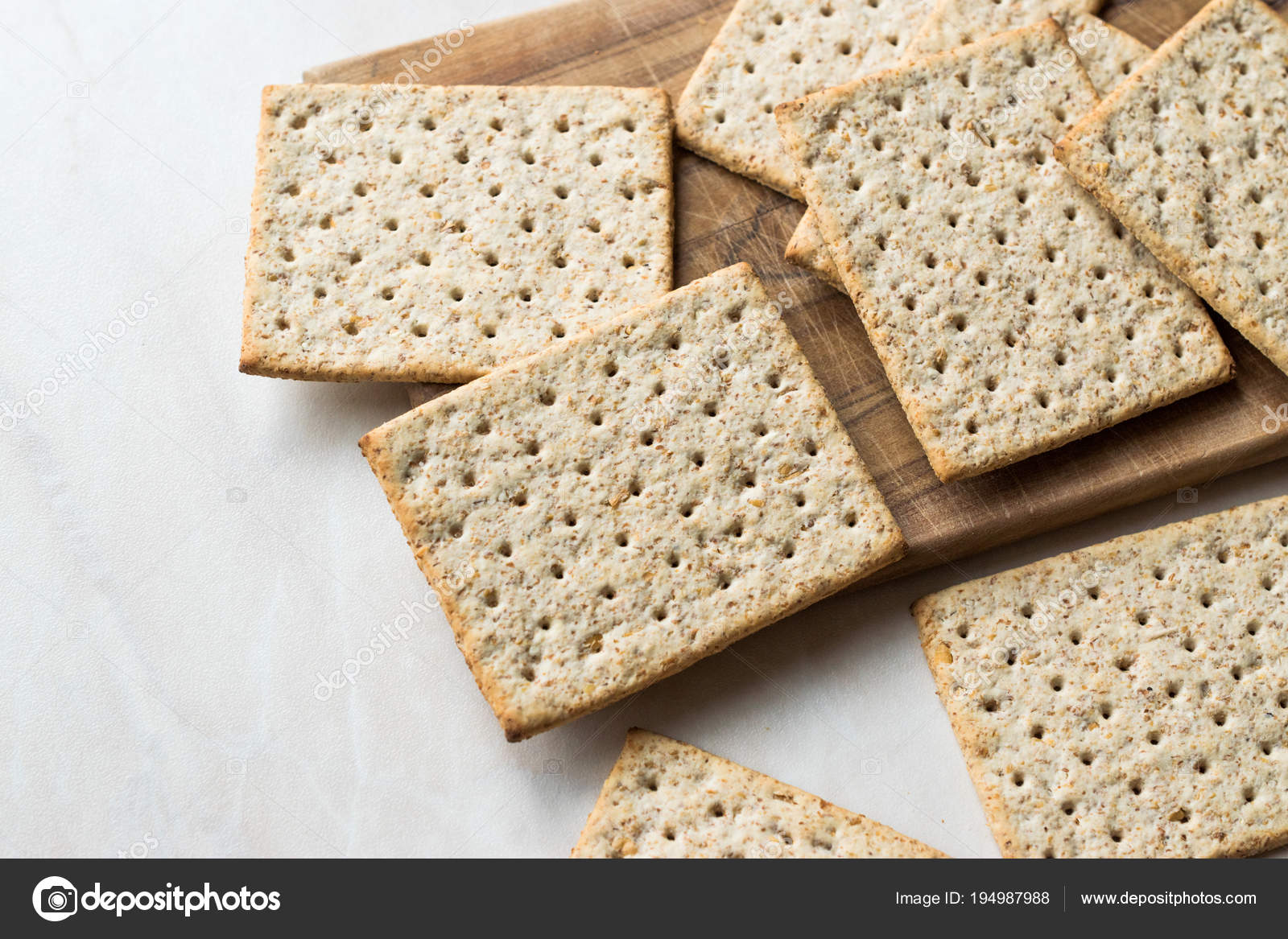 Stack of Honey Flavored Graham Crackers on Wooden Surface. Stock Photo