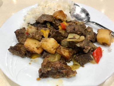 Arnavut Civer with Rice Pilav or Pilaf at Yerel Restoran / Ciger Kebap / Kebap. 