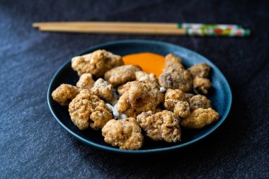 Karaage Japanese Styled Fried Chicken with Sauce / Karaagedon. Traditional Food.