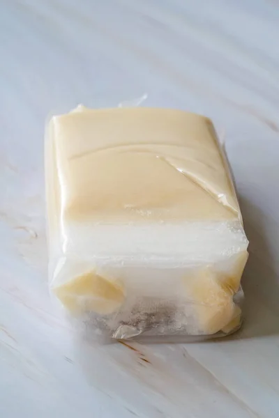 Instant Solid Biologische Kokosmelk Crème in Plastic Pakket te koop. Gezond product. — Stockfoto