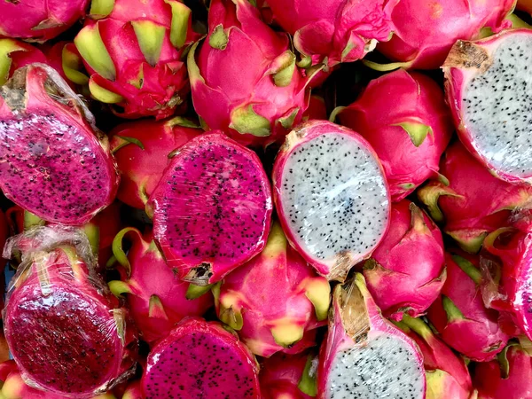 Dragon Fruit For Sale in Transparent Cling Film at Market Bazaar. Organic Healthy Food.
