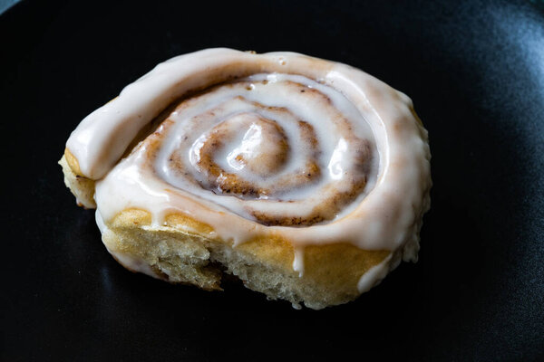 Take Away Cinnamon Roll / Cinnamon Bun with Cream in Plastic Box Package Container for Sale. Ready to Eat. Traditional Dessert.