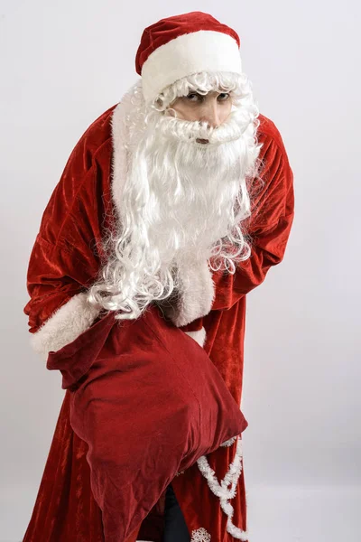 Kerstman met een zak met geschenken — Stockfoto