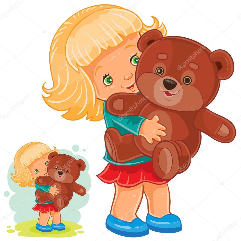 Small girl playing with Teddy bear