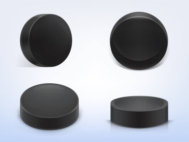 Vector set of black rubber pucks for play hockey clipart