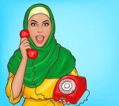 Türbanlı Arap kadın klasik telefondan konuşuyor.