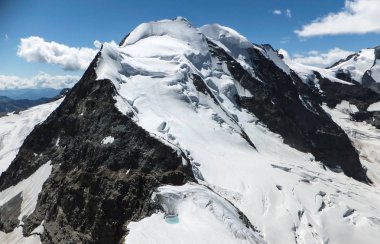 Piz Palu summit in the Swiss Alps near St. Moritz clipart