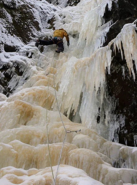 Male Mountain Climber Ice Climbing Frozen Waterfall Winter Mountains Switzerland — Stock Photo, Image