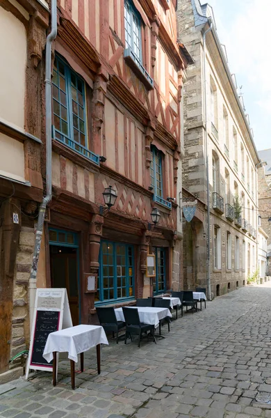 Historic old town in Rennes with half-timbered houses and restaurant waiting for customers — Stock Photo, Image