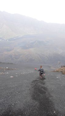 hikers descending the Pico de Fogo volcano on Fogo Island in Cape Verde