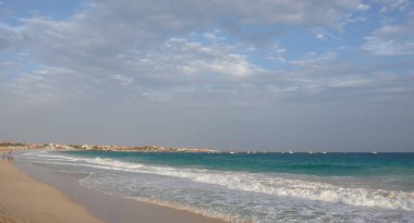 tourists enjoy walking along the tropical beaches in Cape Verde 