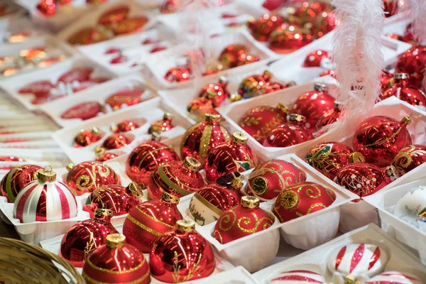 Close up view of beautiful Christmas ornaments and red glass bau — Stock Photo, Image