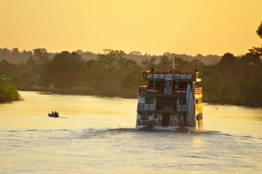 Cruise boat on the Amazon river. clipart