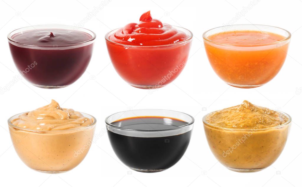 Many different sauces in a glass bowl on a white background 