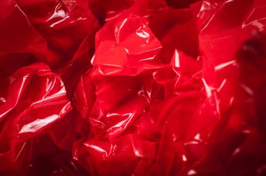 Kullanılmış kırmızı yapıştırıcının arka planı. Soyutlama, doku