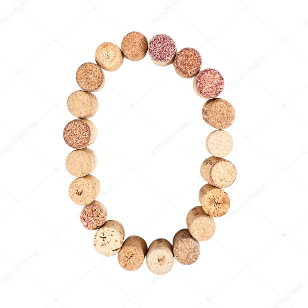 The number 0 is made from wine corks, close-up. Isolated on white background