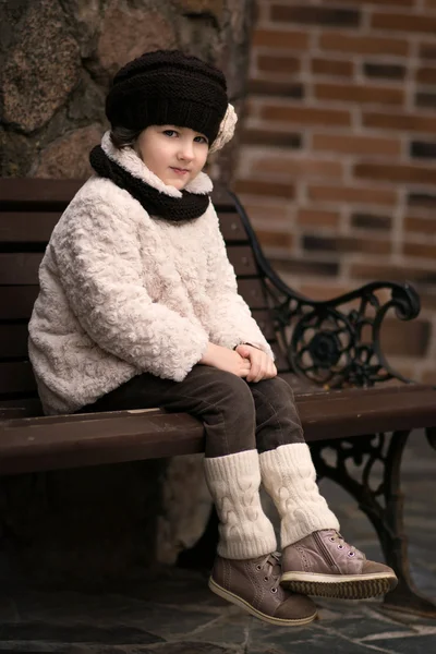 Little fashionable girl in warm clothes — Stock Photo, Image