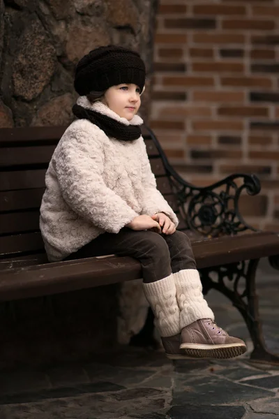 Little fashionable girl in warm clothes — Stock Photo, Image