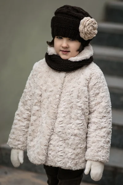 Little fashionable girl in warm clothes — Stock Photo, Image