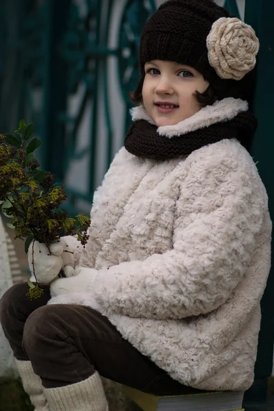 Little fashionable girl in warm clothes — Stock Photo, Image