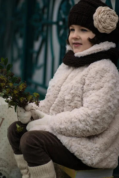 Little fashionable girl in warm clothes — Stock Photo, Image