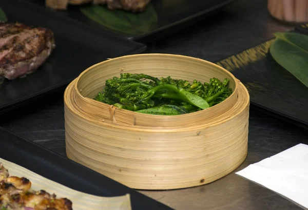 Steamed Broccoli in a bamboo basket
