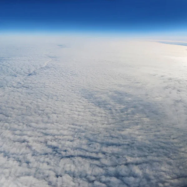 Small clouds photographed from an airplane — Stock Photo, Image