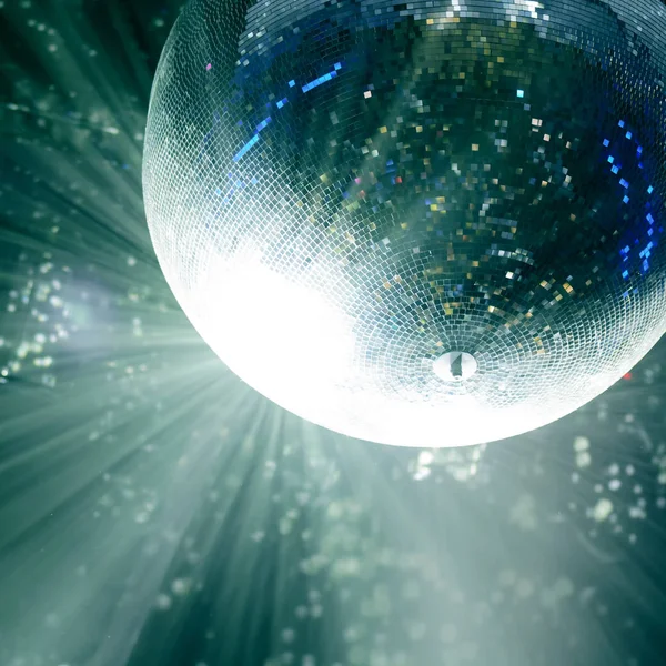 Heldere patches van licht op disco bal. getint — Stockfoto