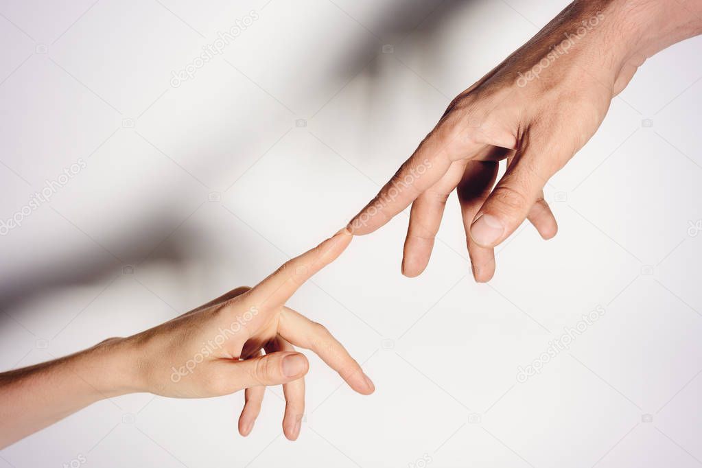 Male and female hands connected with each other together and forever. toned.