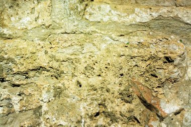 Bir çimento duvar dokusu. Mağara taş yapısı. renkli