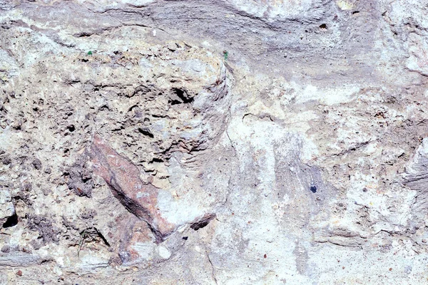 Textura de un muro de cemento. estructura de la piedra de la cueva. teñido —  Fotos de Stock