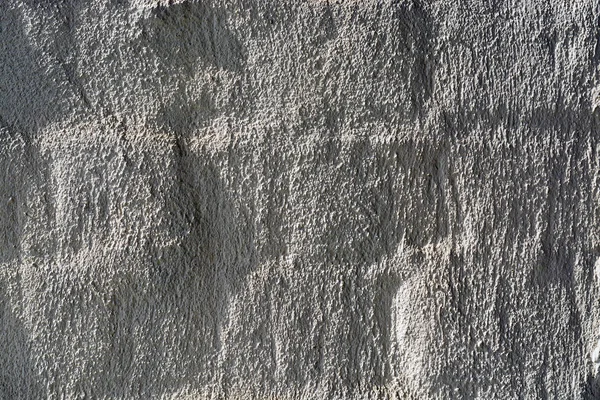 Fond mur en béton, traces d'intempéries, le mur usé peinture endommagée vieille peinture. Des restes de vieille peinture sur la surface en béton peint. Fracture d'une surface rugueuse.Teinté — Photo