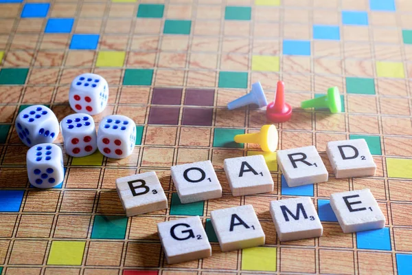 Board games. Home entertainment, games, canvas, cubes, cones. — Stock Photo, Image