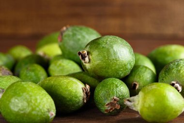 lose up feijoa on brown wooden background