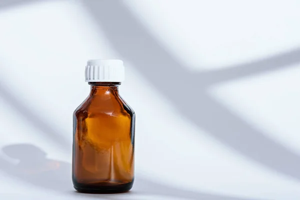 Empty brown glass medical bottle on white background — 스톡 사진