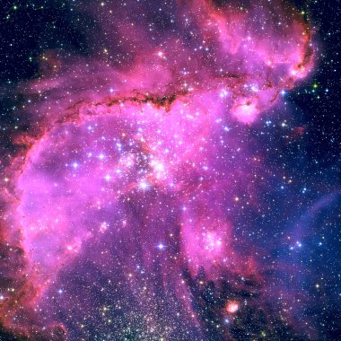 Tukan takımyıldızı yönünde bulunan bir açık yıldız kümesi NGC 346 olduğunu.