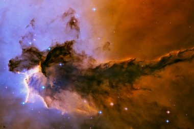 Kartal Nebulası. Yıldız kreşinden gaz ve toz yükseliyor..