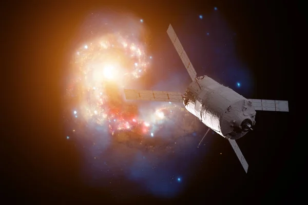 Διαστημικό σκάφος φορτίου - το αυτοματοποιημένο όχημα μεταφοράς πάνω από σπειροειδής γαλαξίας. — Φωτογραφία Αρχείου