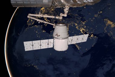 SpaceX Dragon Dünya 'nın yörüngesinde dönüyor..