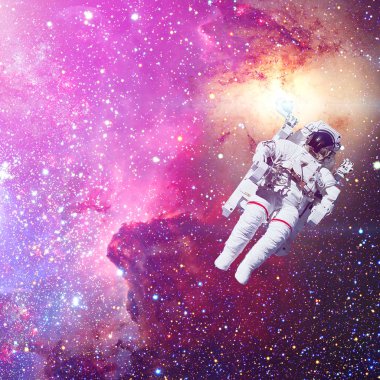 Astronot uzayda. Bulutsusu ve arka plan üzerinde yıldız.