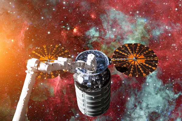 Cargo spacecraft - The Automated Transfer Vehicle over nebula. — Stock Photo, Image