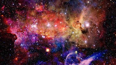 Nebula ve galaksilerle dolu açık bir alan. Bu görüntünün elementleri NASA tarafından desteklenmektedir