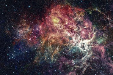 Nebula ve galaksiler uzayda. Bu görüntünün elementleri NASA tarafından desteklenmektedir.