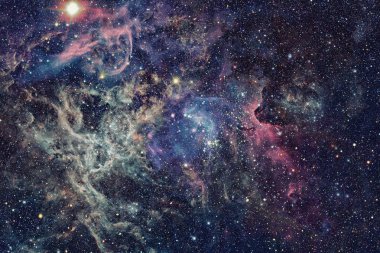 Nebula ve galaksiler uzayda. Bu görüntünün elementleri NASA tarafından desteklenmektedir.