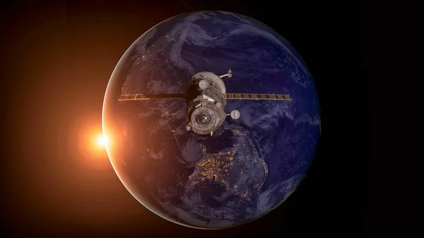 Πρόοδο του διαστημικού σκάφους σε τροχιά γύρω από τη γη. — Φωτογραφία Αρχείου